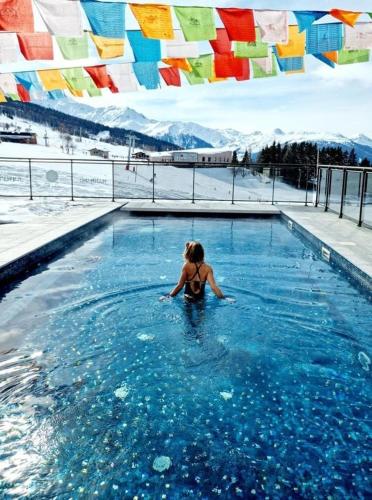 Kolam renang di atau dekat dengan Arc 1600 - 2 pièces ouvert, 4 personnes, signé Charlotte Perriand