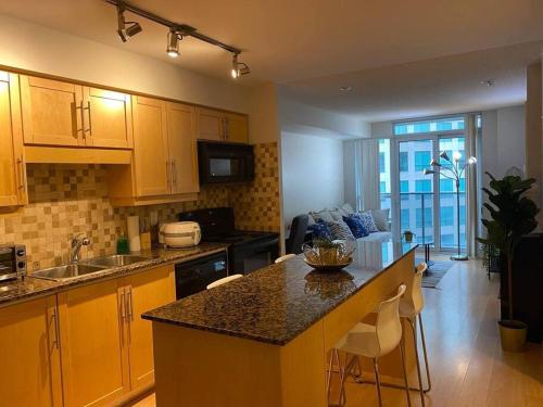 1+Den Condo with Balcony, Free Parking