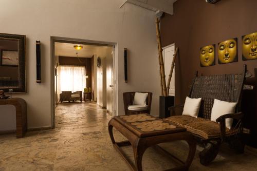 a living room with a couch and a table at BlueBay Villas Doradas Adults Only-All Inclusive in San Felipe de Puerto Plata