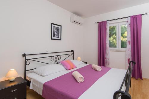 Säng eller sängar i ett rum på Apartment Prižba - Korčula