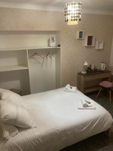 Krevet ili kreveti u jedinici u objektu Hotel de la Forêt