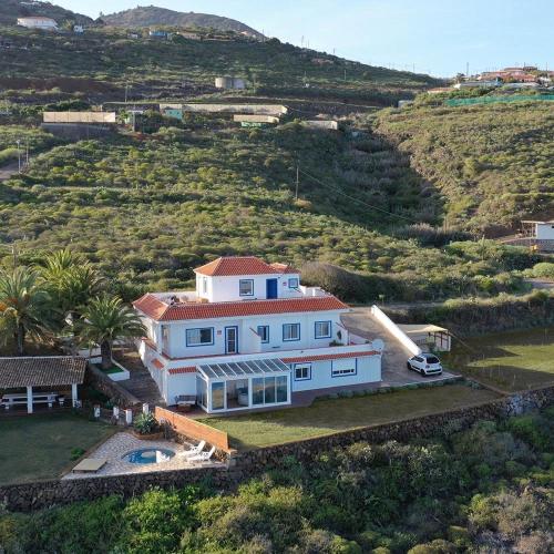 an aerial view of a house on a hill at Cielo Y Mar in Puntallana