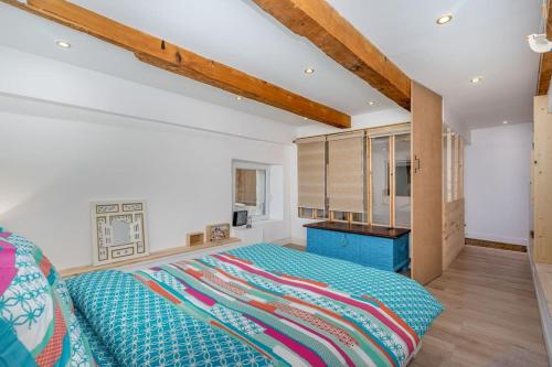 Posteľ alebo postele v izbe v ubytovaní Duplex 4 pers. centre avec cour privée ensoleillée