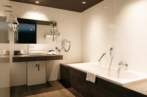 Bagno di Van der Valk Hotel Apeldoorn - de Cantharel