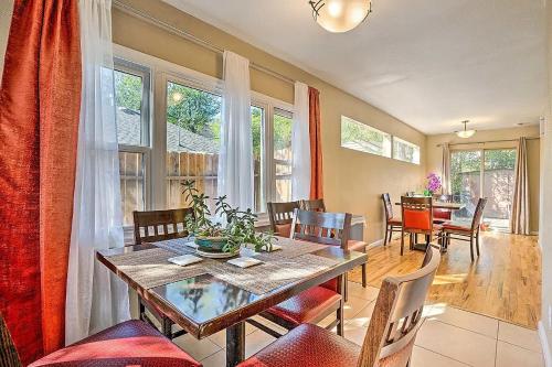 a dining room with a table and chairs and a room with a dining room at Westside Large Home in Colorado Springs