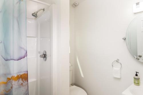 a bathroom with a shower and a toilet at Puni Mauka B 31 plus day rental in Pahoa