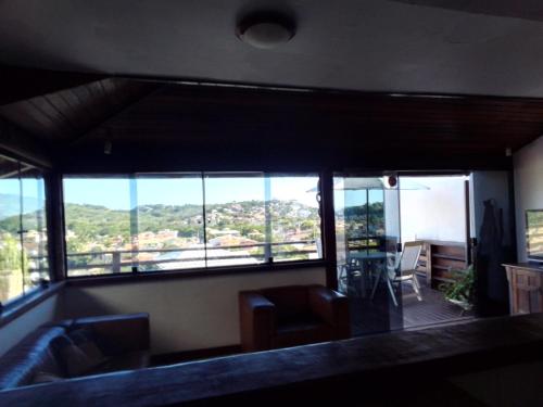 Photo de la galerie de l'établissement Casa em Geribá ampla duas suítes com piscina e vista dentro de condominio, à Búzios