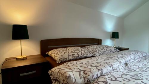 Postel nebo postele na pokoji v ubytování Ski House Tornik Zlatibor
