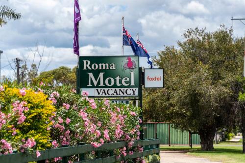 Un certificado, premio, letrero u otro documento en Roma Motel