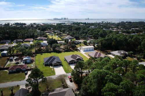 an aerial view of a village with houses and a park at Sunshine State Escape 3 Mi to Navarre Beach! in Navarre