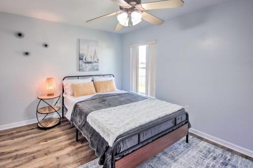 a bedroom with a bed and a ceiling fan at Pool and Fenced Yard Sebring Retreat in Sebring