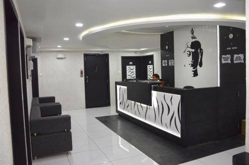 Coin salon dans l'établissement Hotel Paramount Inn