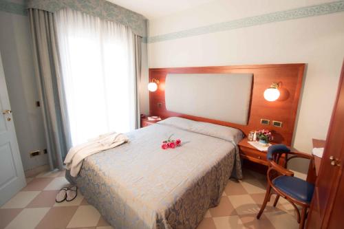 Cama o camas de una habitación en Hotel Costazzurra