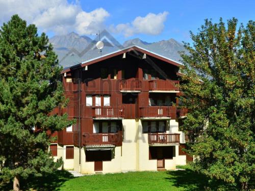 Charmant T2 Montchavin La Plagne, 36m², balcon sud, proche pistes et commerces, parking gratuit