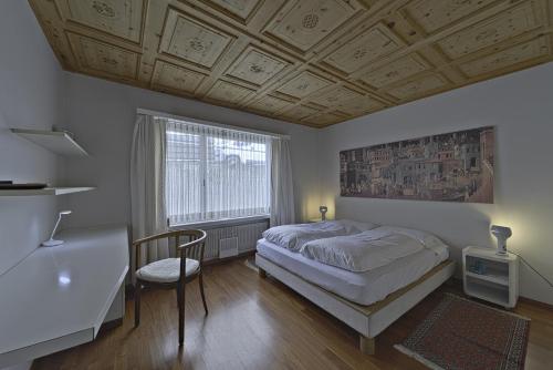 Vuode tai vuoteita majoituspaikassa Allod Brattas - Sankt Moritz