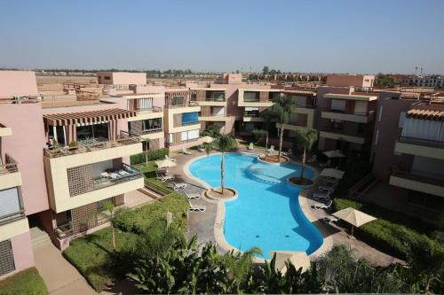 Πισίνα στο ή κοντά στο APPARTEMENT RIAD WHITE GOLDEN
