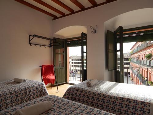 Postel nebo postele na pokoji v ubytování Casa La Espartería de la Corredera