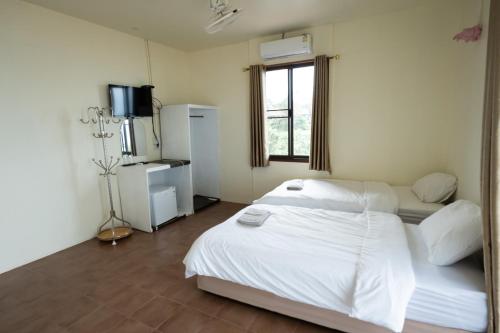 Кровать или кровати в номере Mimo Guesthouse