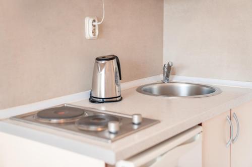 Kuchyň nebo kuchyňský kout v ubytování Apartments Serafimoski