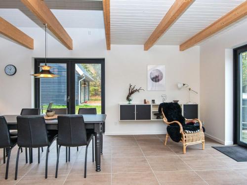 a dining room with a table and chairs at 6 person holiday home in Hovborg-By Traum in Hovborg