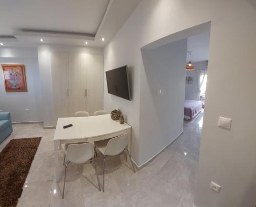 Televízia a/alebo spoločenská miestnosť v ubytovaní Zeppelin apartment