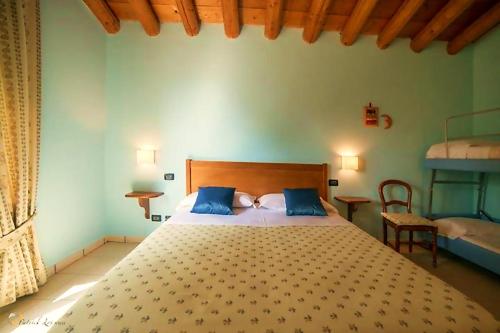 Katil atau katil-katil dalam bilik di Agriturismo Altobello