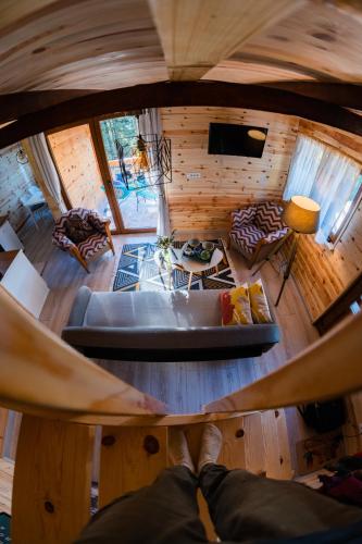 an overhead view of a hammock in a tiny house at Vilovi Botić in Nova Varoš
