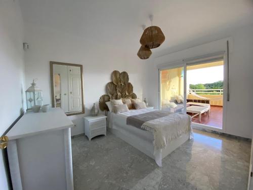 Postel nebo postele na pokoji v ubytování Apartamentos Costa Quebrada