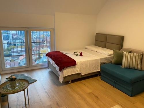 Llit o llits en una habitació de Studio Lola