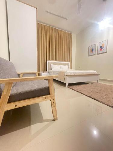 Postel nebo postele na pokoji v ubytování Abu Rakan Apartment