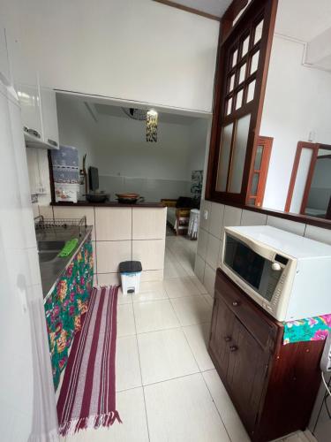 Η κουζίνα ή μικρή κουζίνα στο Hospedagem Villa Caiçara