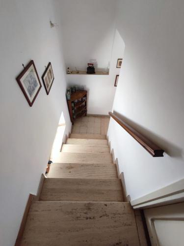 Postel nebo postele na pokoji v ubytování Casa Vacanza Nonna Maria