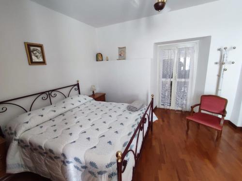 Postel nebo postele na pokoji v ubytování Casa Vacanza Nonna Maria