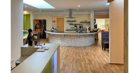 a kitchen with a island in the middle of a room at Lee ZEN in Leezen