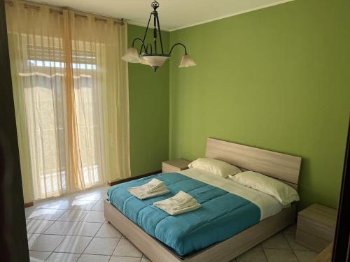 Ένα ή περισσότερα κρεβάτια σε δωμάτιο στο Orio Relax 24h Airport 1 - 3 minute from arrival by bus