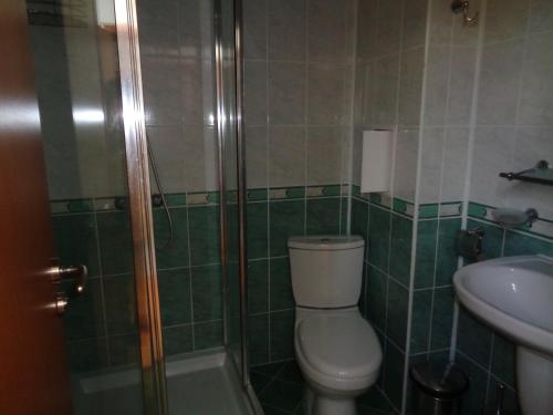 a bathroom with a toilet and a sink at Apartment N4 in Sunset Beach 2,Слънчев бряг in Sunny Beach