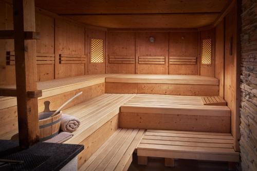 a japanese sauna with wooden walls and floors at Alpinresort Stubaierhof ****s in Fulpmes