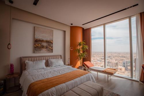 Postel nebo postele na pokoji v ubytování Apartment Riyadh Rafal Tower 93