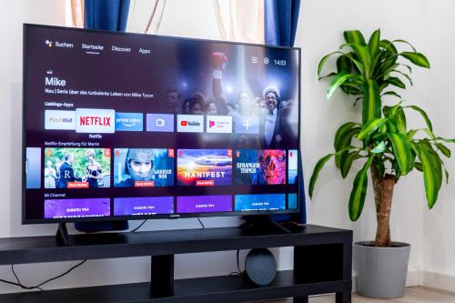 Televisyen dan/atau pusat hiburan di Große 3-Zimmer Wohnung - zentral-Coburg - kostenloser Parkplatz