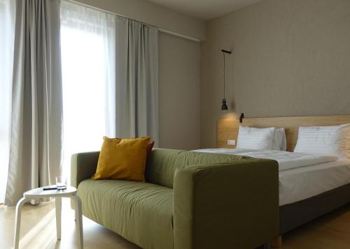 Postel nebo postele na pokoji v ubytování Marida Hotel