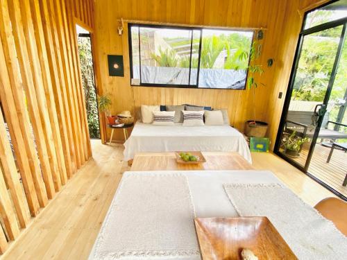 Postel nebo postele na pokoji v ubytování CASA BÚHO