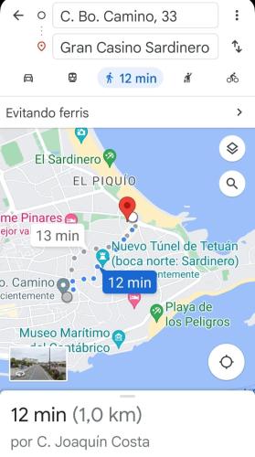 a screenshot of a cell phone with a map at Apartamento Zona Playa y centro Ciudad in Santander