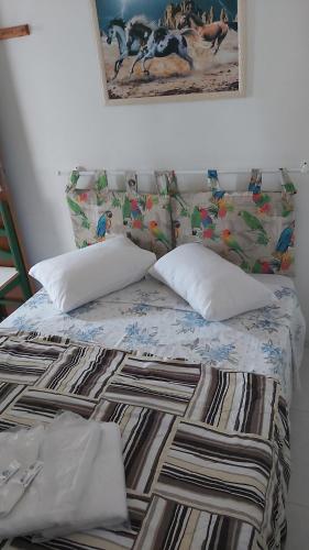 Postel nebo postele na pokoji v ubytování Hotel Pousada Girassol