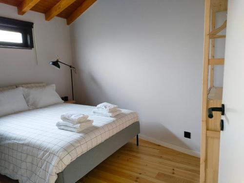 Ένα ή περισσότερα κρεβάτια σε δωμάτιο στο Casa d´ Avó Glória