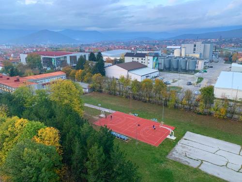 an overhead view of a city with a red roof at Apartman Panorama Niksic in Nikšić