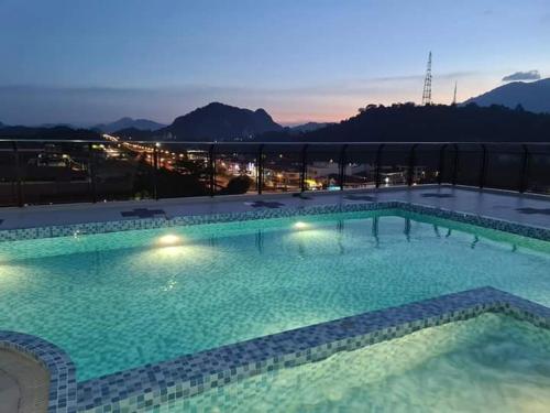 a large swimming pool on top of a building at Armada Sweet Homestay in Gua Musang
