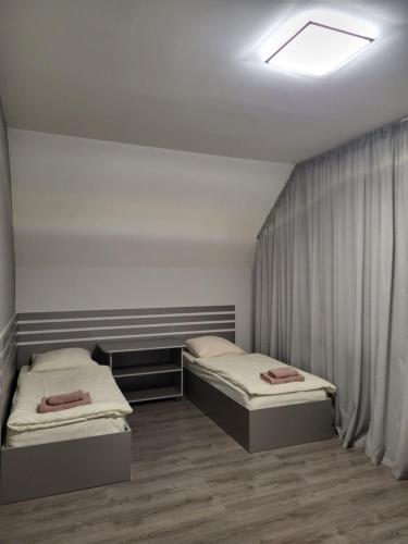 Ένα ή περισσότερα κρεβάτια σε δωμάτιο στο NEW апартаменты на Гвардейской