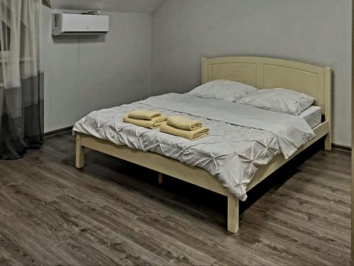 Ένα ή περισσότερα κρεβάτια σε δωμάτιο στο NEW апартаменты на Гвардейской