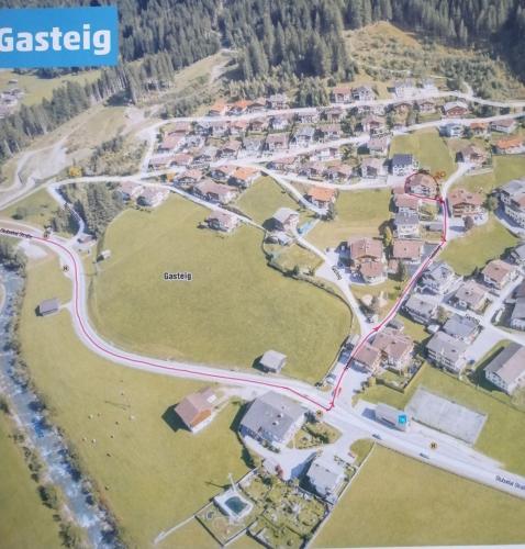 an aerial view of a village with houses and roads at Alpenhaus Christian in Neustift im Stubaital