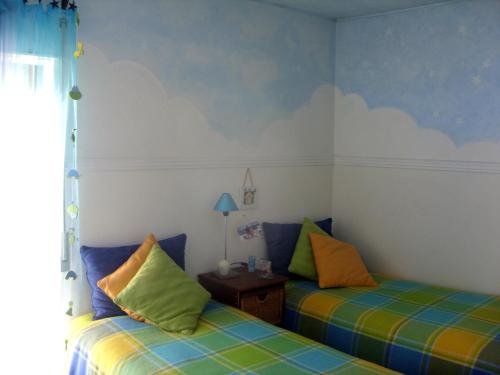 Ein Bett oder Betten in einem Zimmer der Unterkunft Sesimbra4you